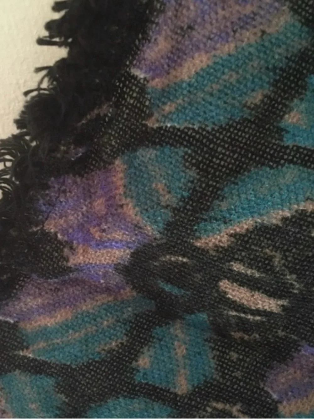 Urban Outfitters Infinity Scarf, with shades of purple, black, and teal.